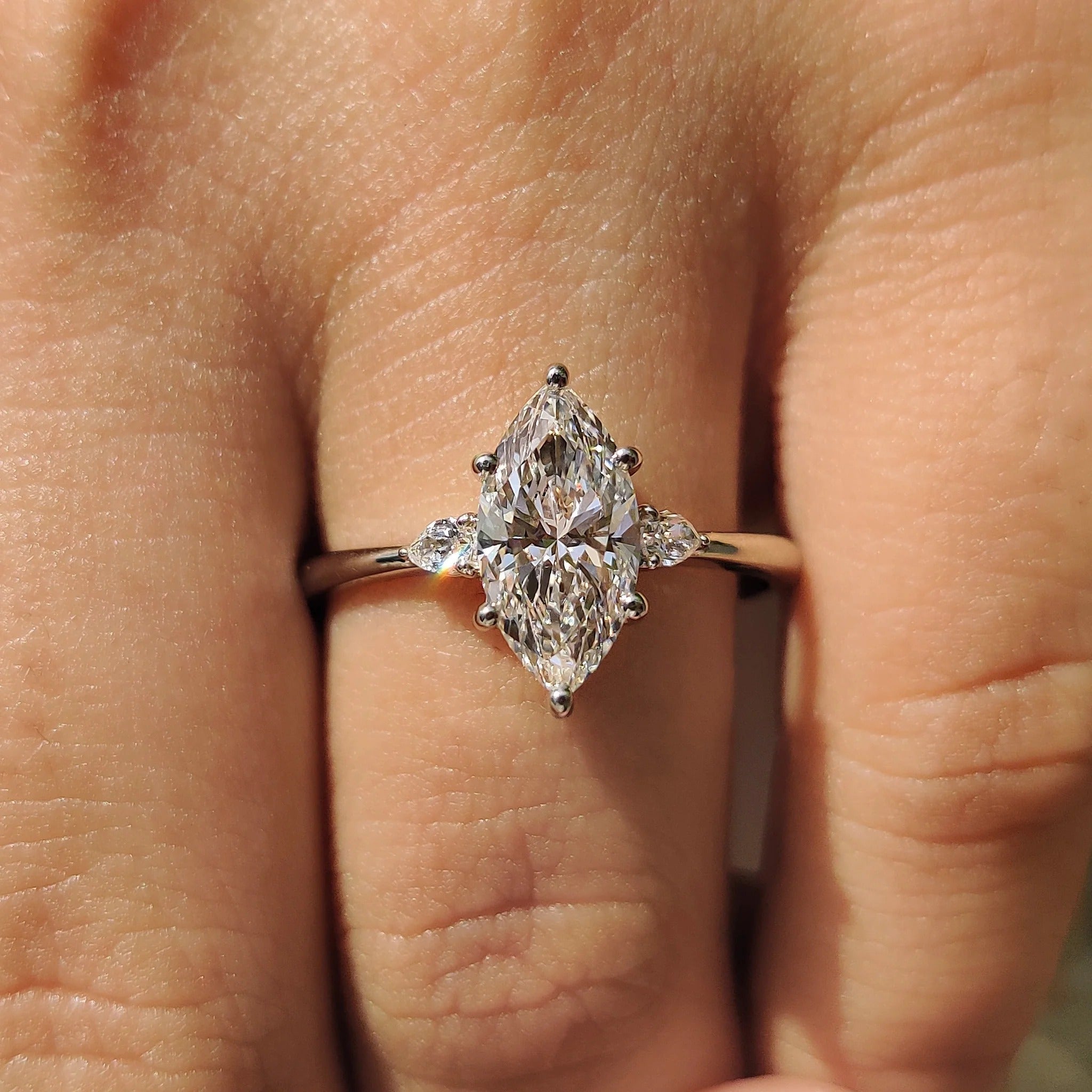 Three Stone Marquise & Pear Diamond Ring