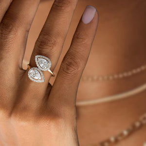 14k Cross Over Pear Shaped Halo Diamond Ring