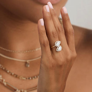 14k Cross Over Pear Shaped Halo Diamond Ring
