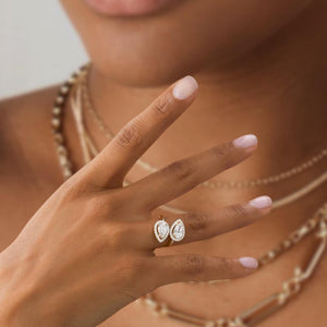 14k Cross Over Pear Shaped Halo Diamond Ring