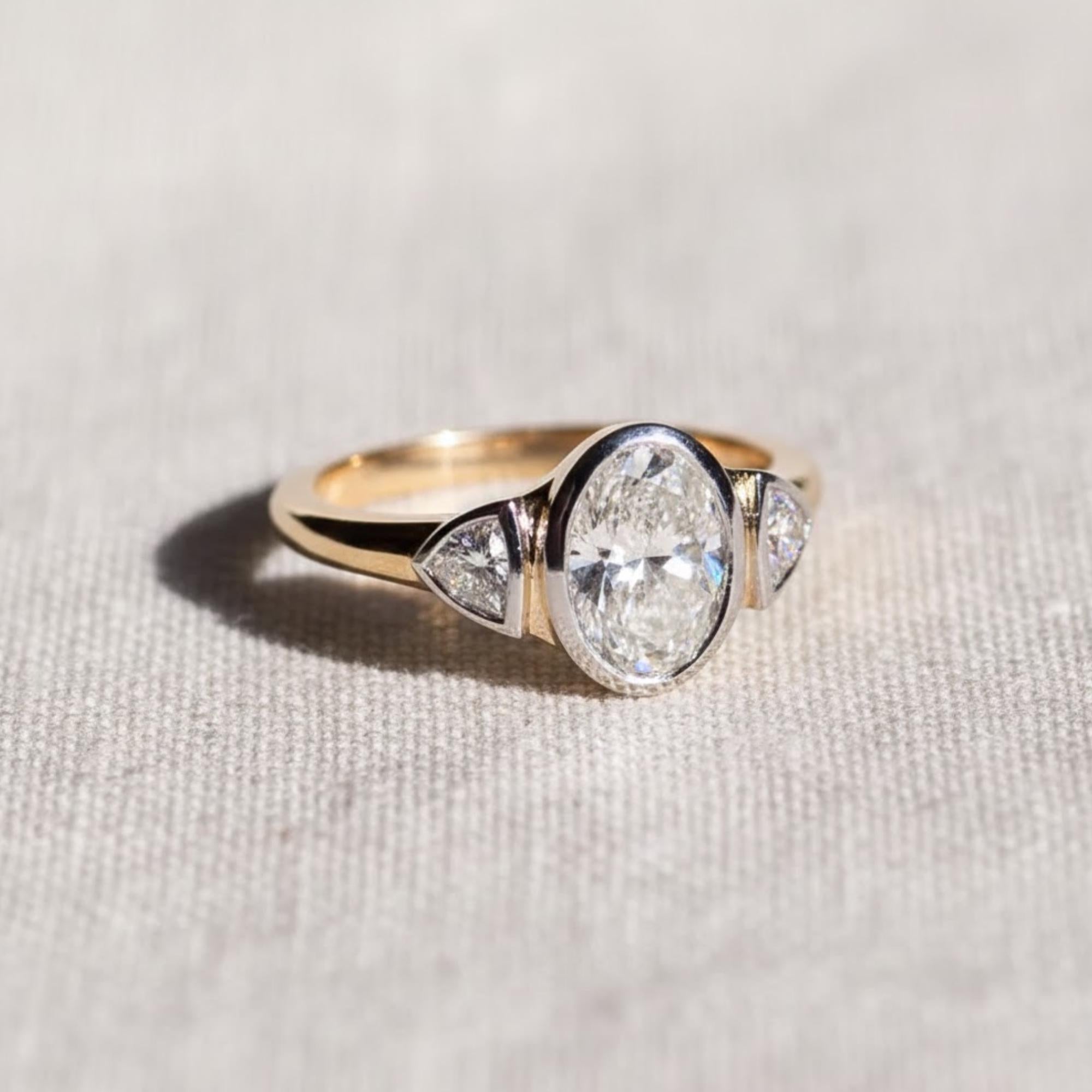 Oval Three Stone Bezel Set Lab Diamond Ring