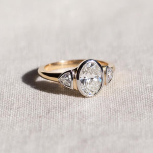 Oval Three Stone Bezel Set Lab Diamond Ring