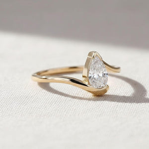 1.5 Ct Pear Cut Diamond Half Bezel Engagement Ring