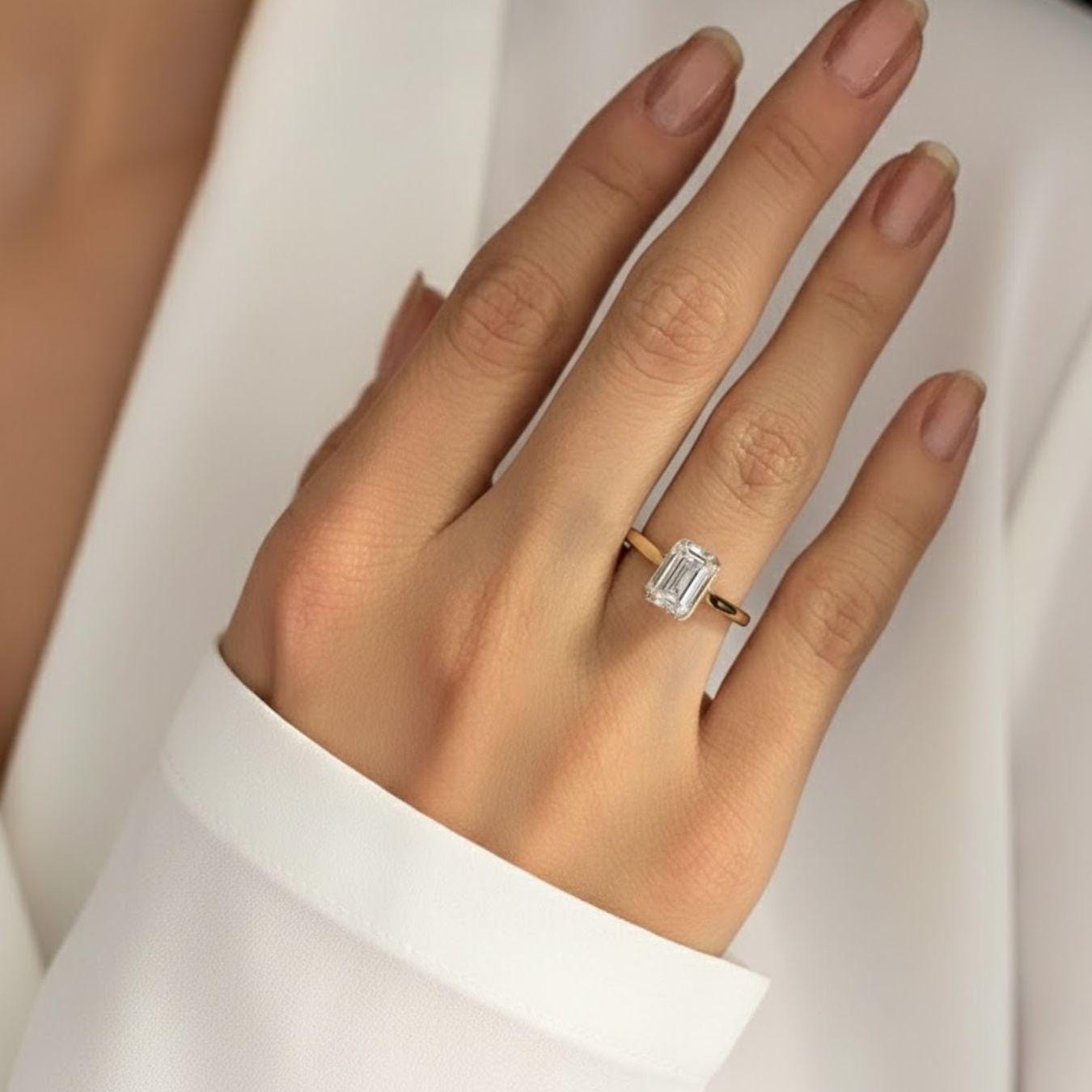 Emerald Cut Diamond Solitaire Ring in 14k Yellow Gold