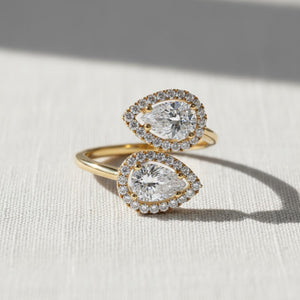 14k Cross Over Pear Shaped Halo Diamond Ring