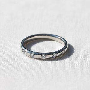 Delicate Flush Set Round Diamond Wedding Band