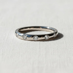 Delicate Flush Set Round Diamond Wedding Band