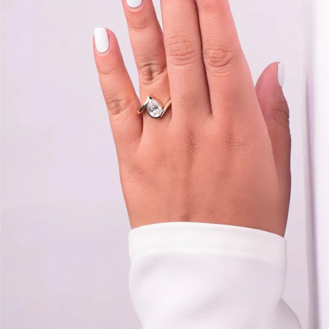 1.5 Ct Pear Cut Diamond Half Bezel Engagement Ring