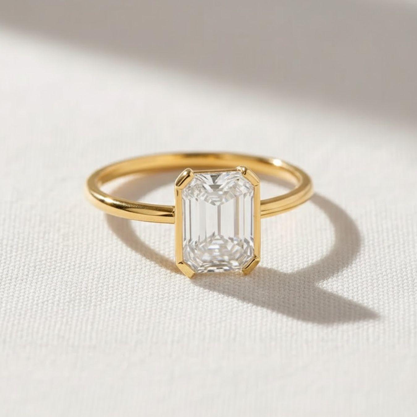 Emerald Cut Diamond Solitaire Ring in 14k Yellow Gold