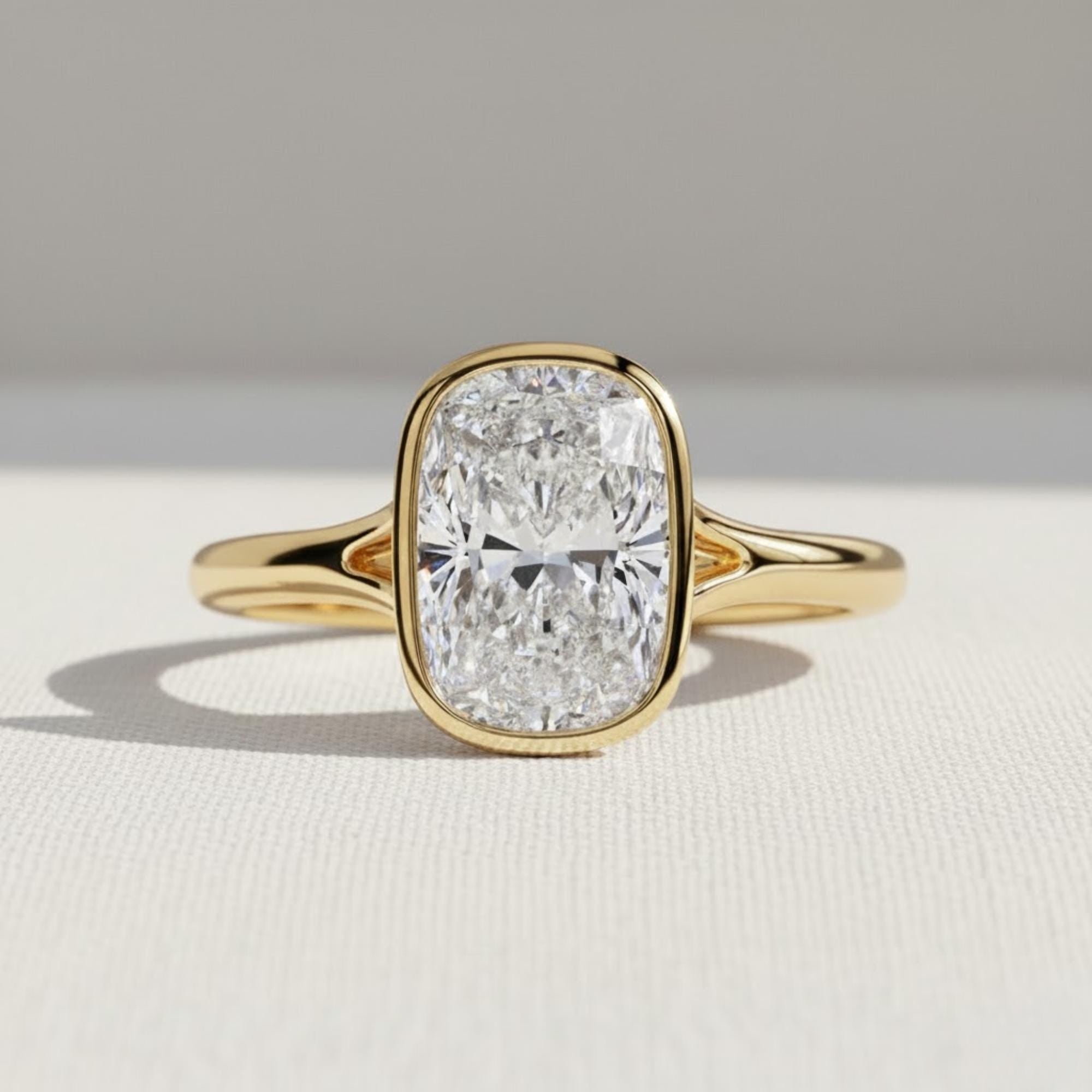 Elongated Cushion Bezel Set Engagement Ring