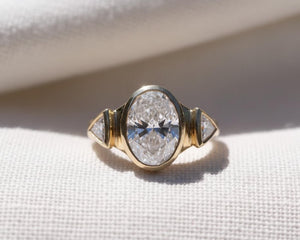 Oval Three Stone Bezel Set Lab Diamond Ring