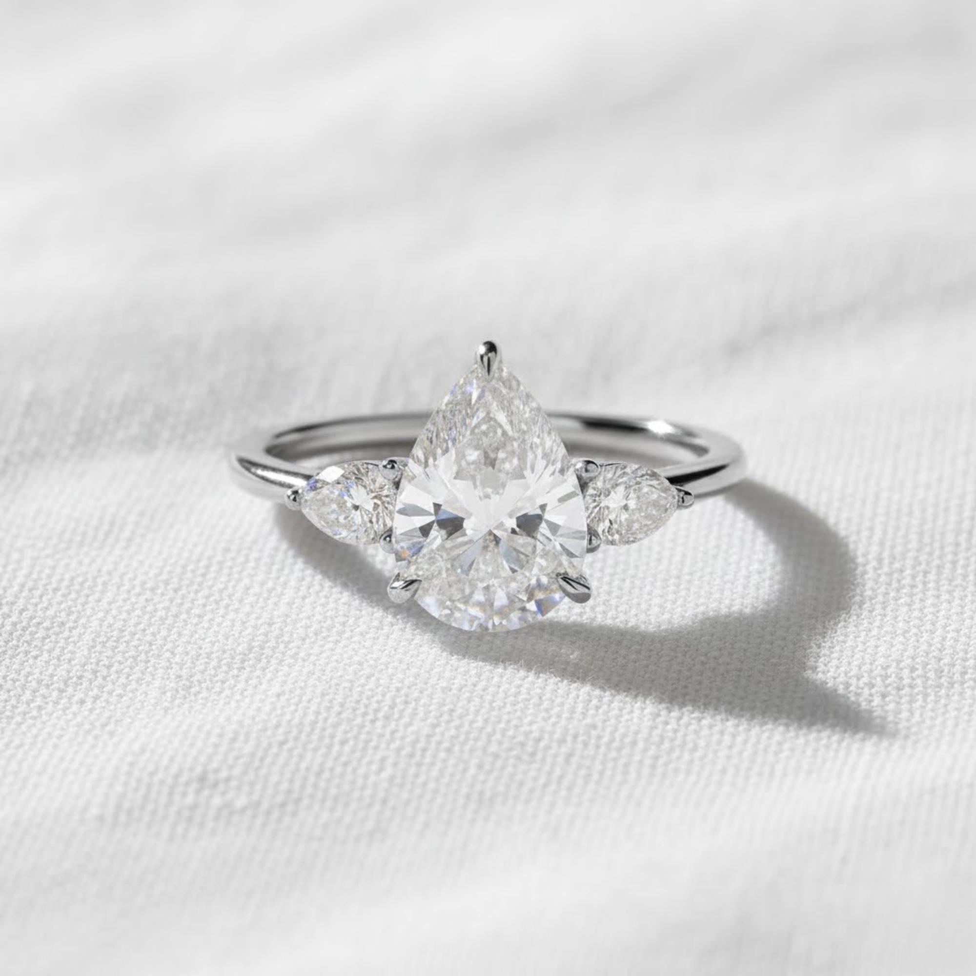 Pear Lab Diamond Three Stone Engagement Ring, IGI Certified