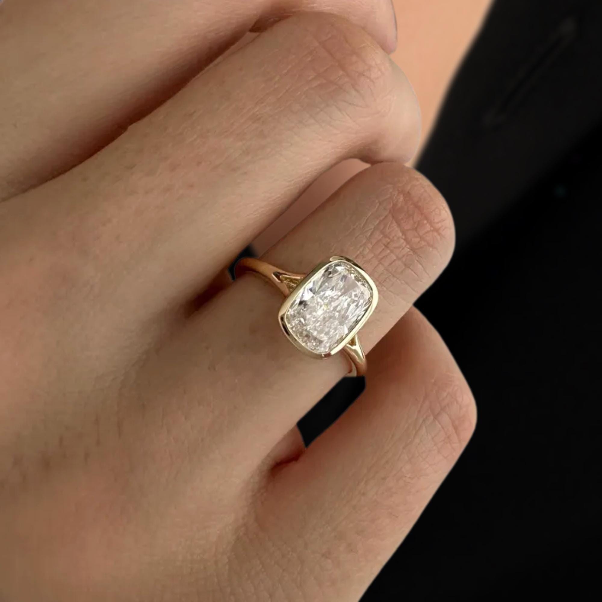 Elongated Cushion Bezel Set Engagement Ring