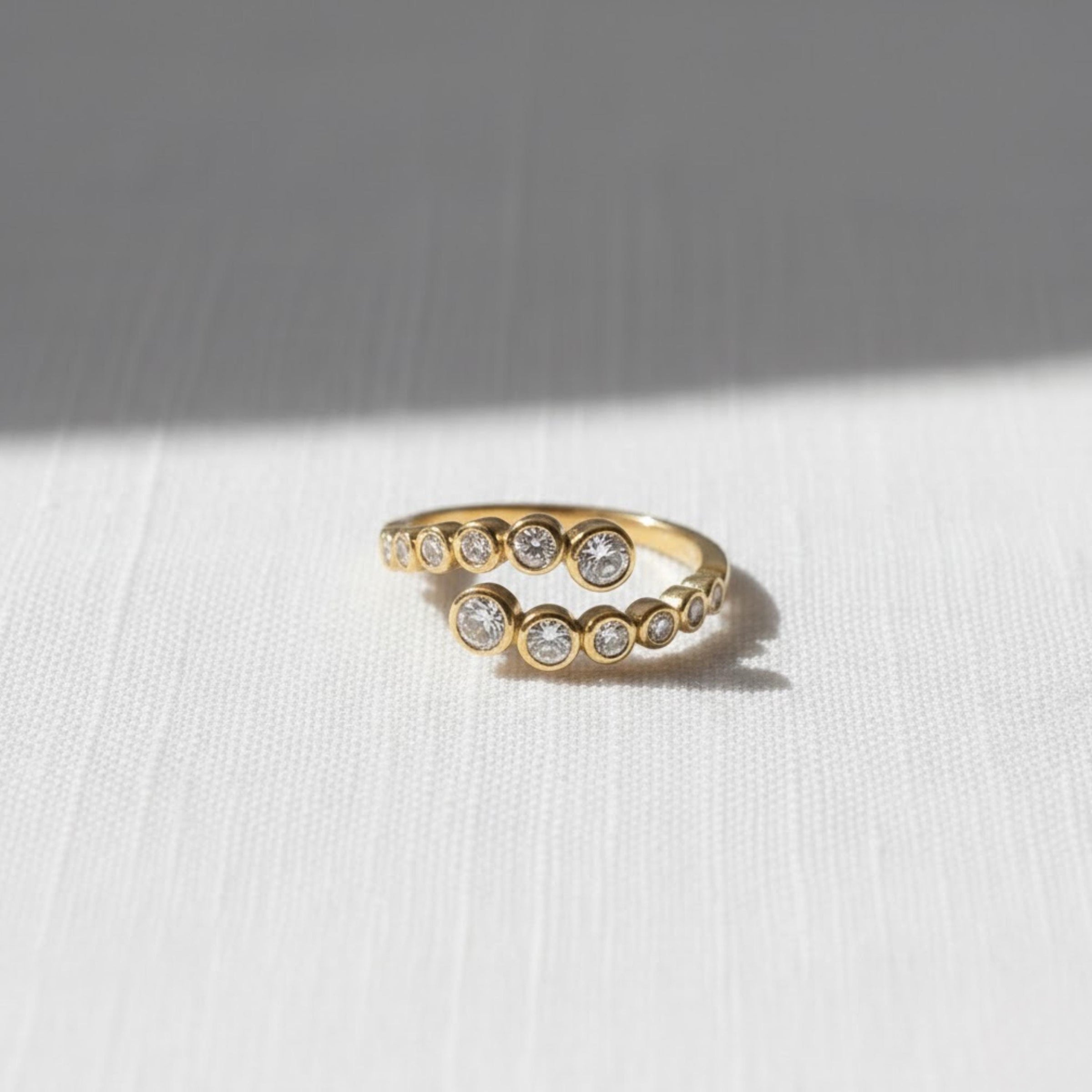 14K Gold Diamond Bypass Bezel Ring