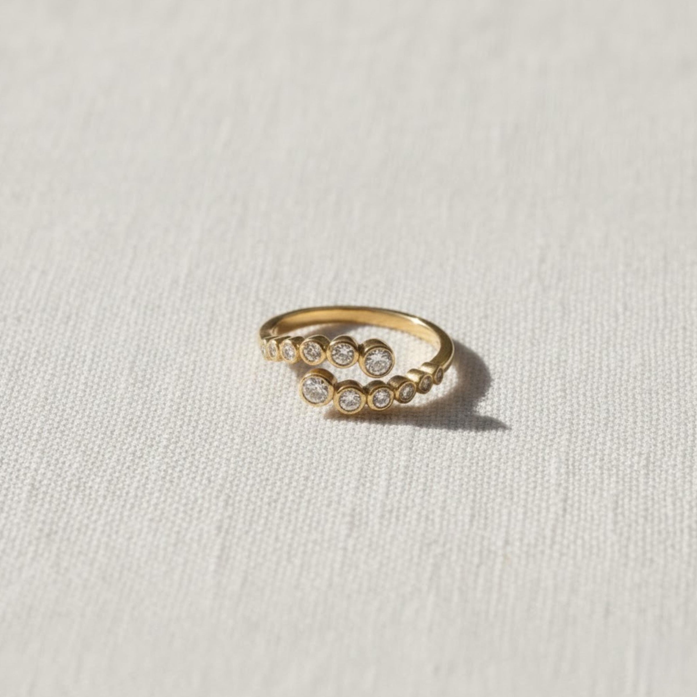 14K Gold Diamond Bypass Bezel Ring