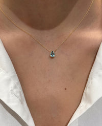 Pear Cut Blue Topaz Bezel Set Solitaire Necklace