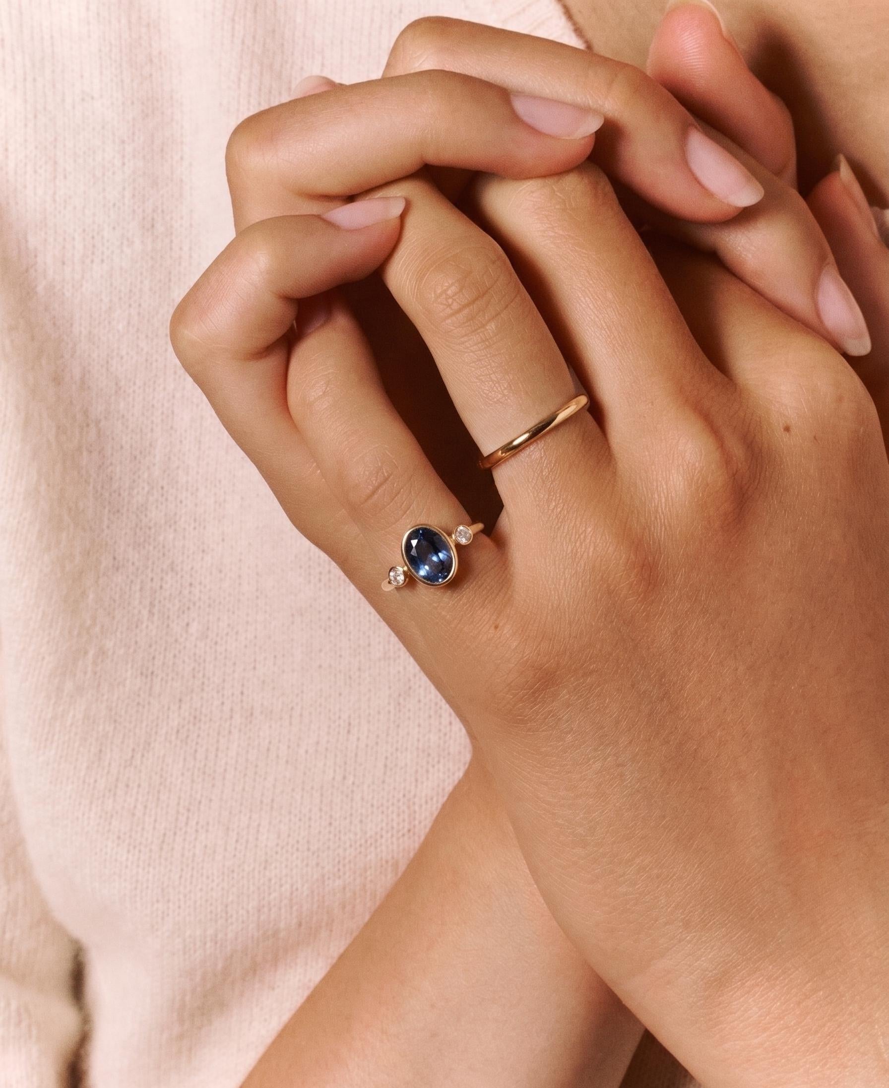 2 Ct Blue Oval Lab Diamond Three Stone Bezel Engagement Ring